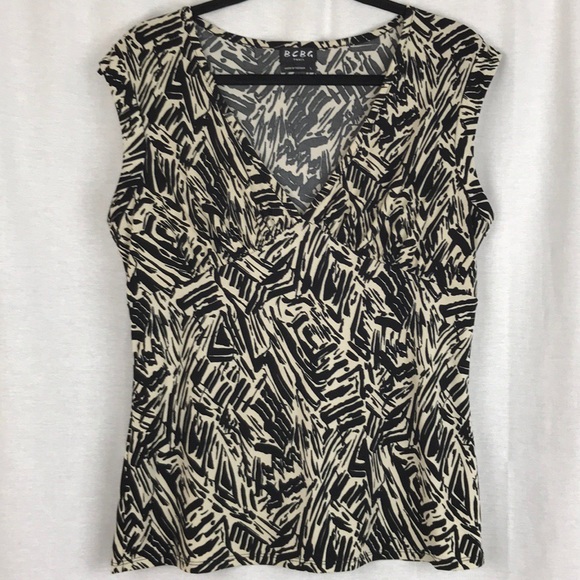 BCBG Paris Tops - 💛Sale💛 BCBG Paris Sleeveless Blouse